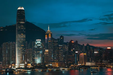 Hong Kong Tour Packages | Safari Sutra Holidays Hong Kong Victoria Harbour skyline at night — tour packages from Mumbai, Pune, Bangalore | Safari Sutra